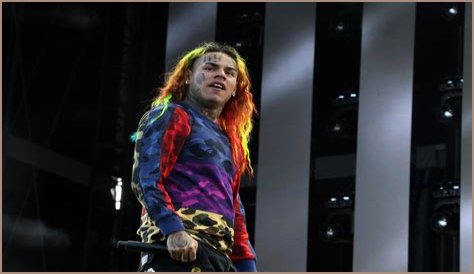 6ix9ine Jeered By Large Crowd While Being Arrested In The Dominican Republic, Mugshot Surfaces Online